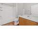 Clean bathroom with a bathtub, toilet and wood vanity at 3540 Cactus Shadow St # 201, Las Vegas, NV 89129
