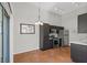 Kitchen with dark cabinets, stainless steel appliances, and tile floors at 3540 Cactus Shadow St # 201, Las Vegas, NV 89129
