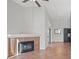 Living room with tile floors, fireplace and access to patio at 3540 Cactus Shadow St # 201, Las Vegas, NV 89129