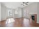 Living room with tile floors, fireplace and access to patio at 3540 Cactus Shadow St # 201, Las Vegas, NV 89129