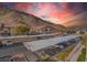 Community parking lot with covered spaces and mountain backdrop at 3540 Cactus Shadow St # 201, Las Vegas, NV 89129