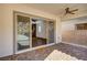 Covered back patio with brick pavers offering outdoor living space at 395 Nine Mile Creek Dr, Las Vegas, NV 89138