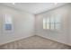 Bedroom with carpeted floors, shutters on the windows, and recessed lighting at 395 Nine Mile Creek Dr, Las Vegas, NV 89138