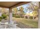 Covered patio with seating area overlooking the yard at 462 Golden State St, Henderson, NV 89012