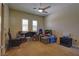 Second bedroom with a ceiling fan and ample space for storage at 4638 Evan Ridge Ct, Las Vegas, NV 89129
