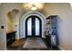 Bright entry with double doors and a rustic wooden shelving unit at 4638 Evan Ridge Ct, Las Vegas, NV 89129