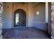 Elegant entryway with ornate iron doors and stonework at 4638 Evan Ridge Ct, Las Vegas, NV 89129