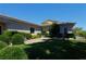 Well-maintained home exterior with manicured landscaping at 4638 Evan Ridge Ct, Las Vegas, NV 89129