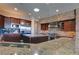 Modern kitchen featuring granite countertops and custom cabinetry at 4638 Evan Ridge Ct, Las Vegas, NV 89129