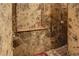 Walk-in shower with marble tile and built-in shelf at 4638 Evan Ridge Ct, Las Vegas, NV 89129