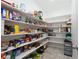 Well-stocked walk-in pantry with ample shelving at 4929 Shady Rim Ct, Las Vegas, NV 89131