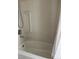 Bathroom tub and shower with a white shower curtain at 509 5Th St, Boulder City, NV 89005