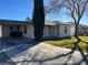 House with carport and well-maintained lawn at 509 5Th St, Boulder City, NV 89005