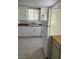 Kitchen featuring white appliances, cabinets and tile backsplash at 509 5Th St, Boulder City, NV 89005