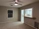 Bright living room with neutral walls and carpet, open to kitchen at 509 5Th St, Boulder City, NV 89005