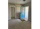 Living room showcasing a blue door, neutral walls and carpet at 509 5Th St, Boulder City, NV 89005