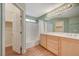 Bathroom boasts double sinks, a bathtub, and a walk-in closet at 5648 Ancient Agora St, North Las Vegas, NV 89031