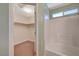 Bathroom features a tub, shower, and a large closet at 5648 Ancient Agora St, North Las Vegas, NV 89031