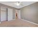 Bedroom with ceiling fan and gray walls at 5648 Ancient Agora St, North Las Vegas, NV 89031