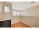 Loft bedroom with wood floors and large window at 5648 Ancient Agora St, North Las Vegas, NV 89031