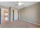Bedroom with ceiling fan and sliding door closet at 5648 Ancient Agora St, North Las Vegas, NV 89031