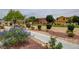 Community with green areas, landscaping and walkways at 5648 Ancient Agora St, North Las Vegas, NV 89031