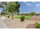 Landscaped green space with walking path at 5648 Ancient Agora St, North Las Vegas, NV 89031