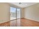 Dining area with hardwood floors and sliding glass doors to backyard at 5648 Ancient Agora St, North Las Vegas, NV 89031