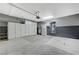 Garage with built-in cabinets and epoxy flooring at 5648 Ancient Agora St, North Las Vegas, NV 89031