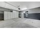 Garage interior with storage cabinets and epoxy floor at 5648 Ancient Agora St, North Las Vegas, NV 89031