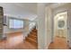Interior view showing stairs, hardwood floors and half bathroom at 5648 Ancient Agora St, North Las Vegas, NV 89031