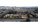 Aerial view of a house on a large lot with city views in the background at 5785 W Russell Rd, Las Vegas, NV 89118