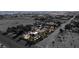 Aerial view of house and large lot with surrounding desert landscape at 5785 W Russell Rd, Las Vegas, NV 89118