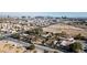 Aerial view showing a large property with a house and a sizable lot, near the city skyline at 5785 W Russell Rd, Las Vegas, NV 89118