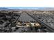 Aerial view showing house, large lot, and surrounding neighborhood at 5785 W Russell Rd, Las Vegas, NV 89118
