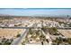Aerial view showcasing a house on a large lot with mature trees and desert landscaping at 5785 W Russell Rd, Las Vegas, NV 89118