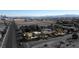 Aerial view of a house on a large lot with city views in the background at 5785 W Russell Rd, Las Vegas, NV 89118