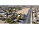 Aerial view of property showing house and lot with city and mountain views in background at 5785 W Russell Rd, Las Vegas, NV 89118