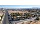 Aerial view of a house on a large lot with city views in the background at 5785 W Russell Rd, Las Vegas, NV 89118