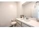 Clean bathroom with white vanity and a large mirror at 804 Aurelie Ridge St, Henderson, NV 89011