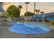 Relaxing kidney-shaped pool with city mural at 8216 Fawn Heather Ct, Las Vegas, NV 89149