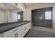 Spa-like bathroom with walk-in shower and gray tile at 8838 Sorrel Hills Ct, Las Vegas, NV 89113