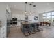Modern kitchen with stainless steel appliances and a large island at 8838 Sorrel Hills Ct, Las Vegas, NV 89113
