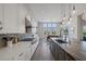 Modern kitchen with stainless steel appliances and a large island at 8838 Sorrel Hills Ct, Las Vegas, NV 89113