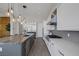 Modern kitchen with stainless steel appliances and a large island at 8838 Sorrel Hills Ct, Las Vegas, NV 89113