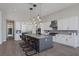 Modern kitchen with stainless steel appliances and a large island at 8838 Sorrel Hills Ct, Las Vegas, NV 89113
