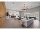 Spacious living area with sliding glass doors and fireplace at 8838 Sorrel Hills Ct, Las Vegas, NV 89113