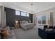 Spacious main bedroom with backyard access and sitting area at 8838 Sorrel Hills Ct, Las Vegas, NV 89113