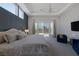 Spacious main bedroom with backyard access and sitting area at 8838 Sorrel Hills Ct, Las Vegas, NV 89113