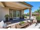 Relaxing patio with seating area and access to pool at 8838 Sorrel Hills Ct, Las Vegas, NV 89113